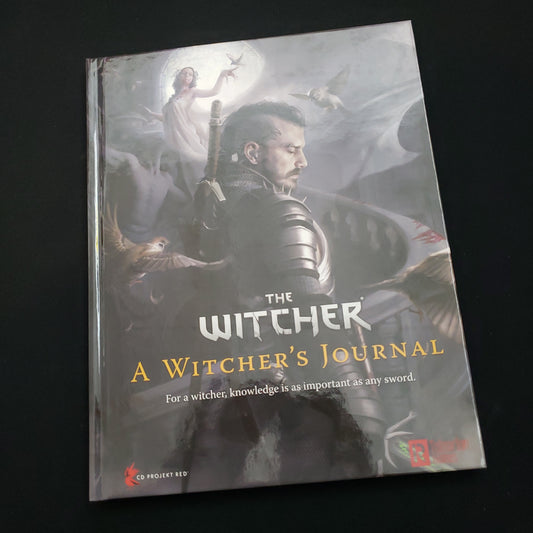 Image shows the front cover of the Witcher's Journal book for the Witcher roleplaying game