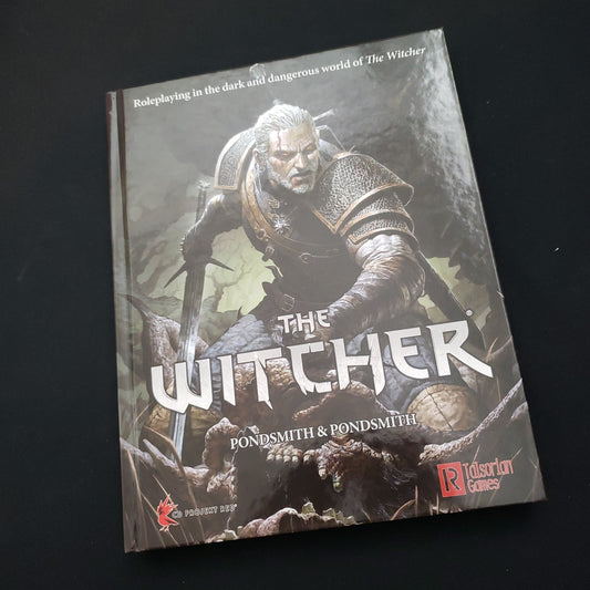 Image shows the front cover of the core rulebook for the Witcher roleplaying game