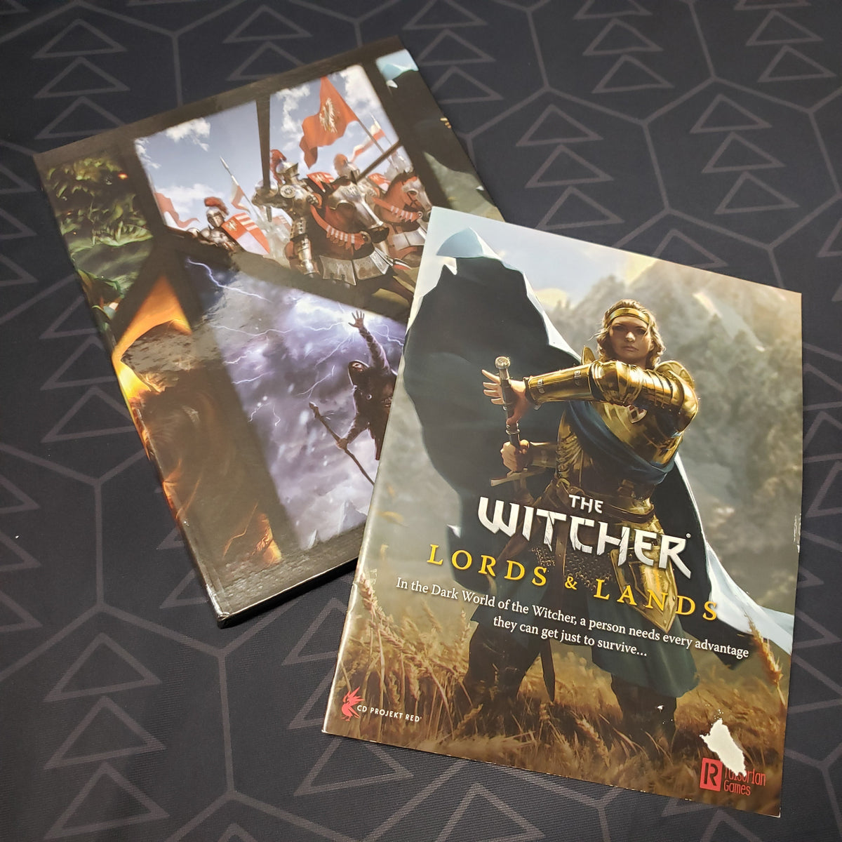 Image shows the front cover of the GM screen and booklet for the Lords & Lands pack for the roleplaying game the Witcher