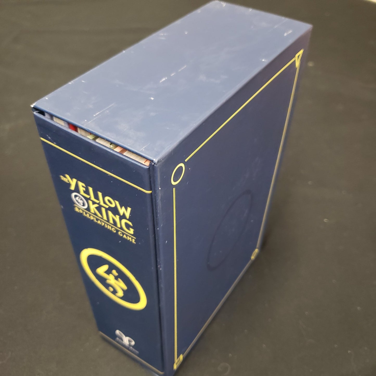 Image shows the outer box of the Yellow King Roleplaying Game box set