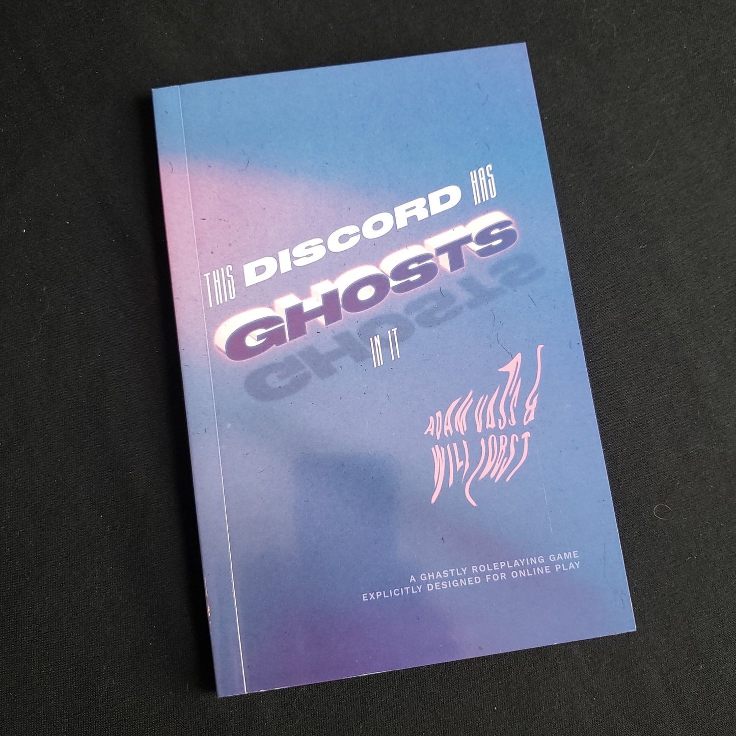 Image shows the front cover of the This Discord Has Ghosts In It roleplaying game book