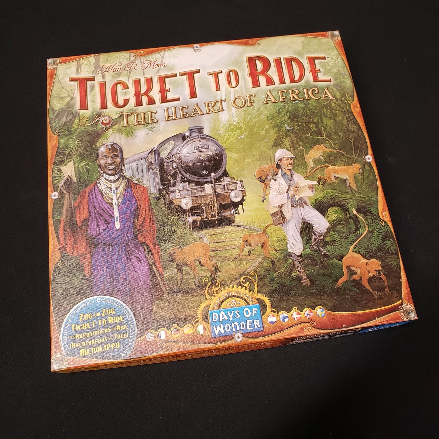 Image shows the front cover of the box of the Heart of Africa map collection for the board game Ticket to Ride