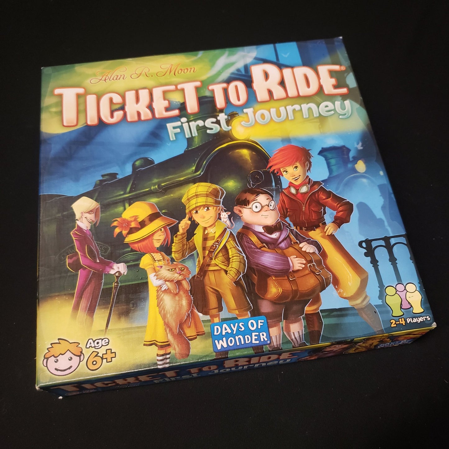 Image shows the front cover of the box of the Ticket to Ride: First Journey board game