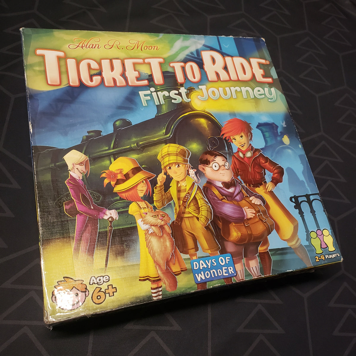 Image shows the front cover of the box of the Ticket to Ride: First Journey board game