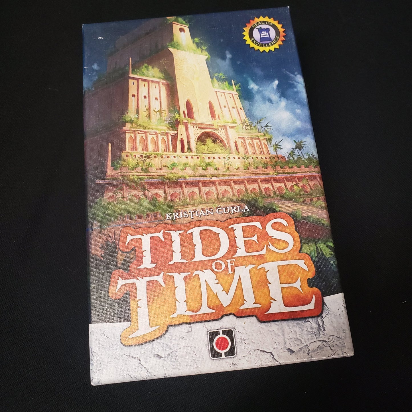 Image shows the front cover of the box of the Tides of Time card game