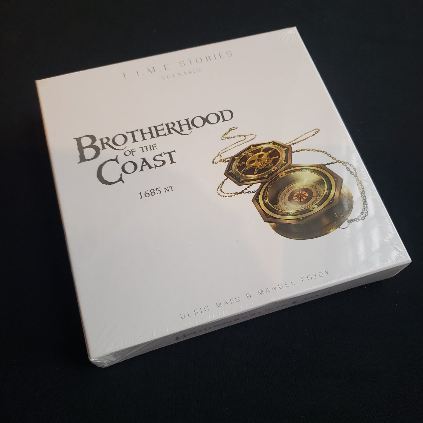Image shows the front cover of the box of the Brotherhood of the Coast expansion for the board game TIME Stories