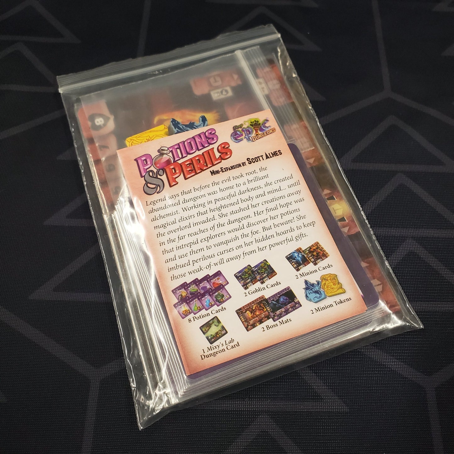 Image shows the bagged components of the Potions & perils mini expansion for the board game Tiny Epic Dungeons