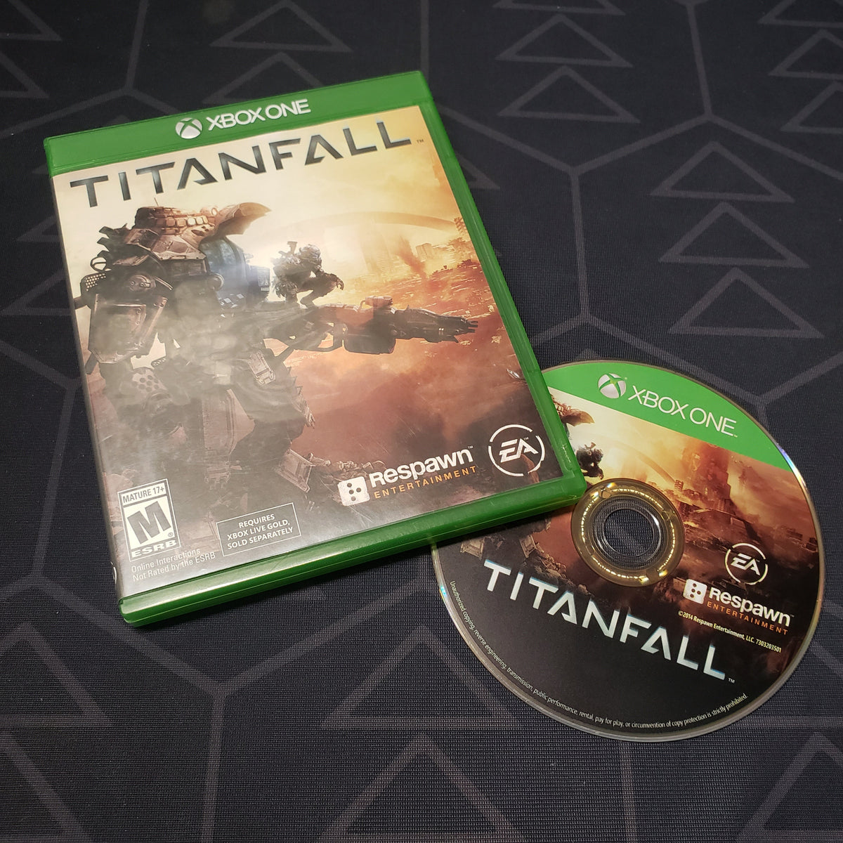 Image shows the case and disc for the video game Titanfall for Xbox One