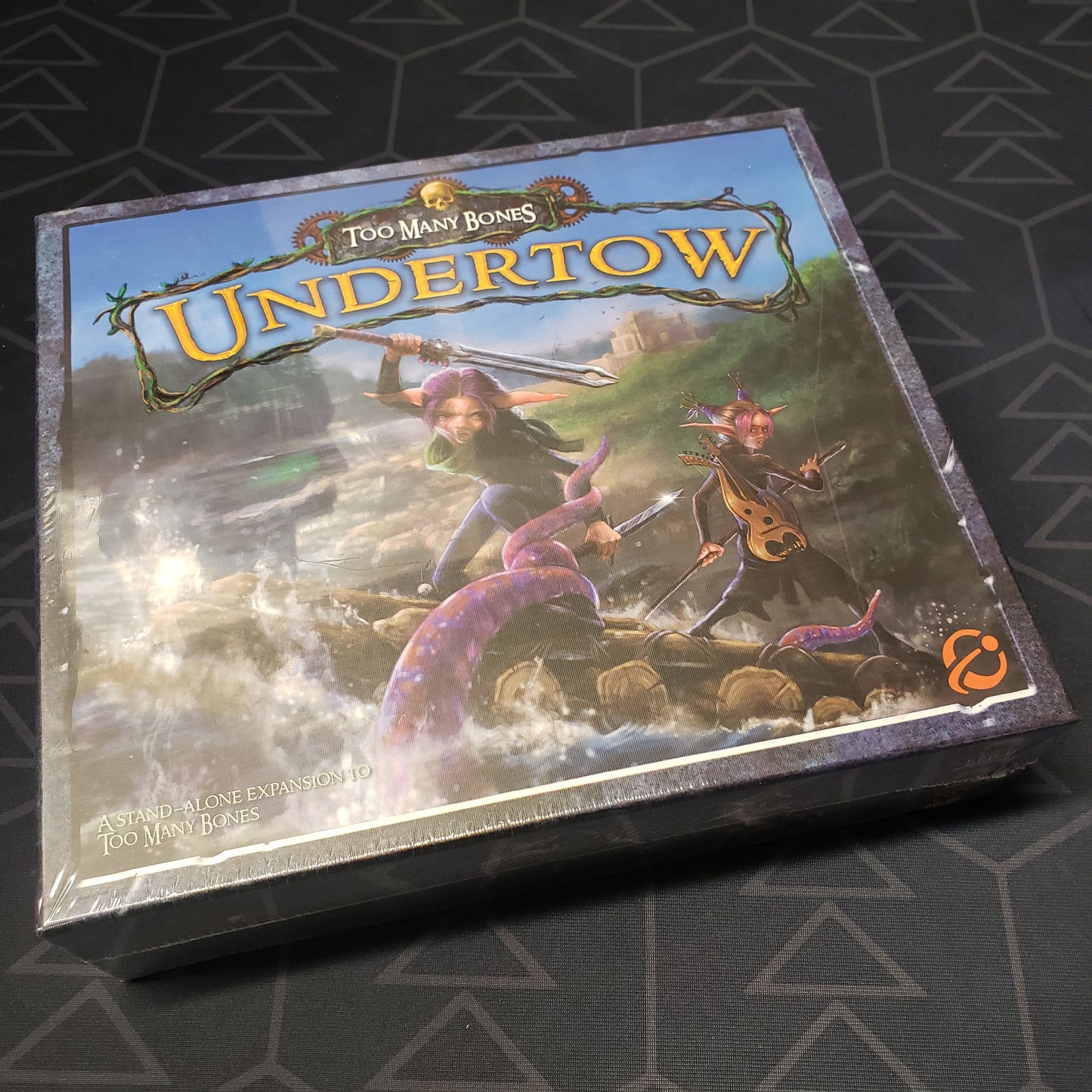 Image shows the front cover of the box of the Too Many Bones: Undertow board game