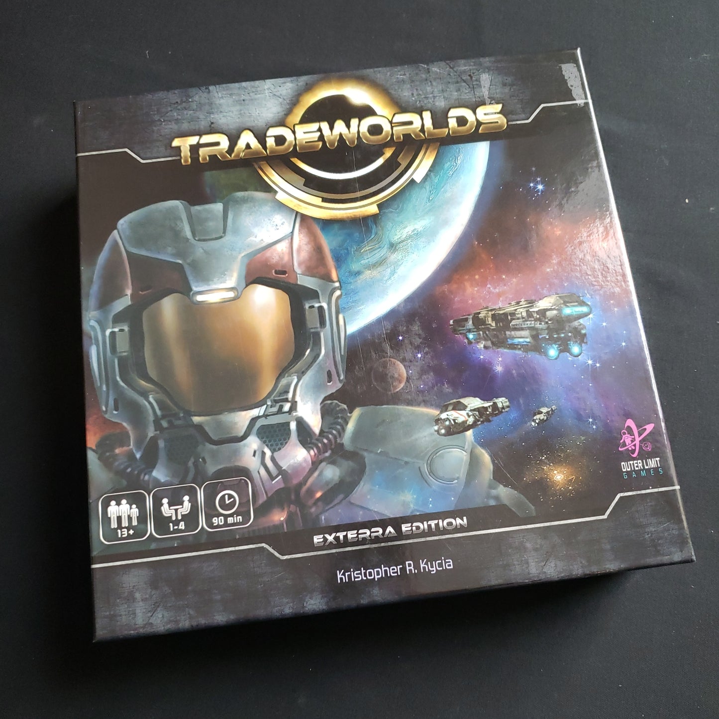 Image shows the front cover of the box of the Tradeworlds board game