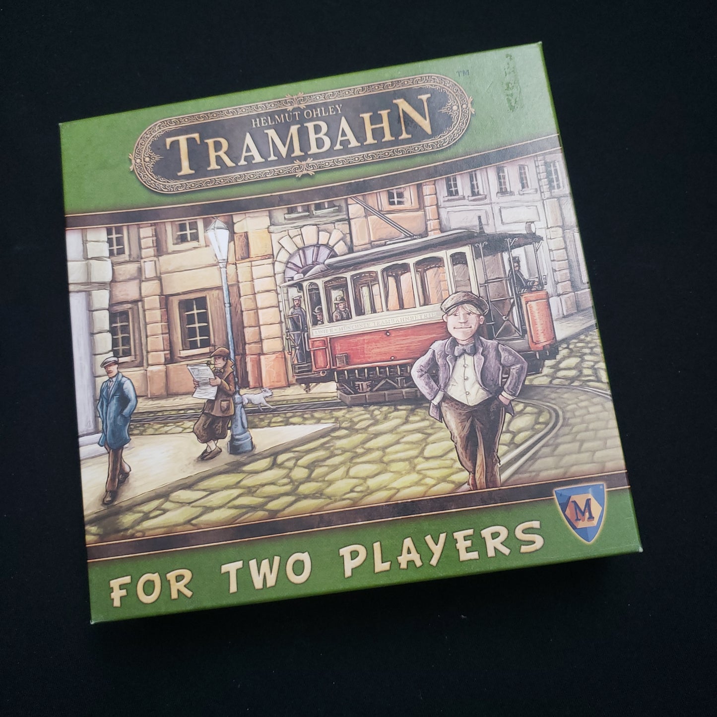 Image shows the front cover of the box of the Trambahn board game