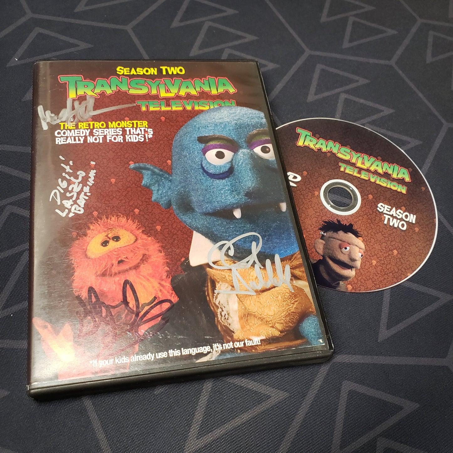 Image shows the autographed case & disc for the movie tv show Transylvania Television: Season 2 on DVD