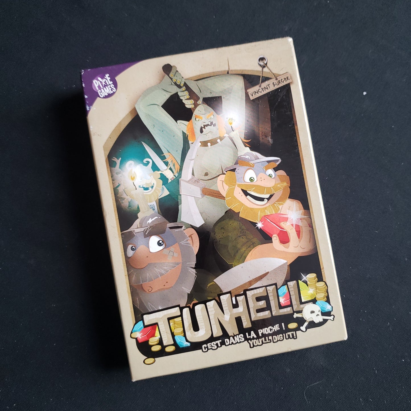 Image shows the front cover of the box of the TunHell card game
