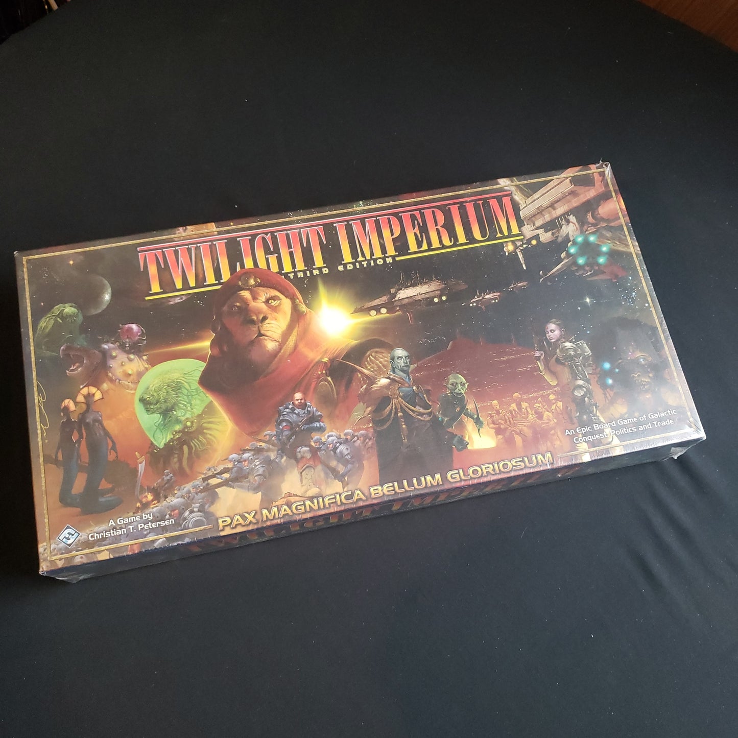 Image shows the front cover of the box of the Twilight Imperium board game