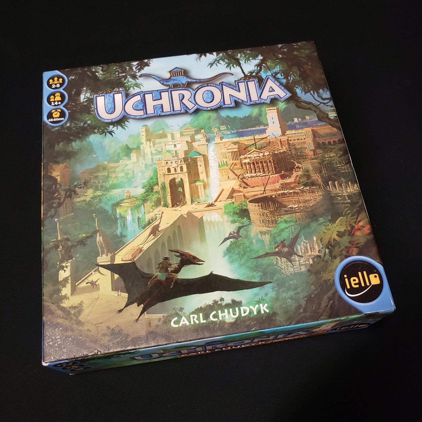 Image shows the front cover of the box of the Uchronia board game