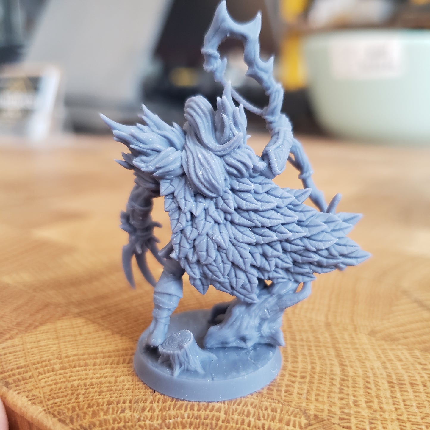 Image is a photo of a 3D printed elf druid gaming miniature printed in-house at All Systems Go