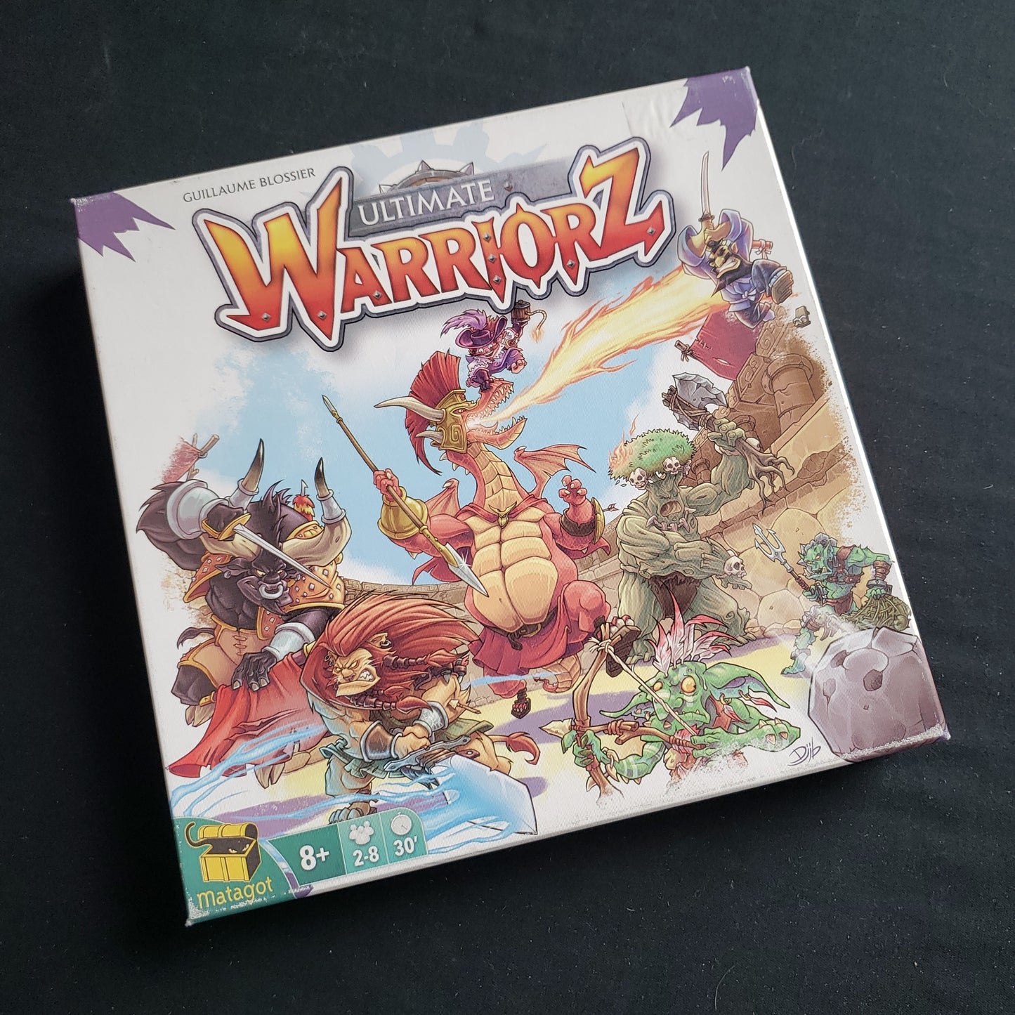 Image shows the front cover of the box of the Ultimate Warriorz board game