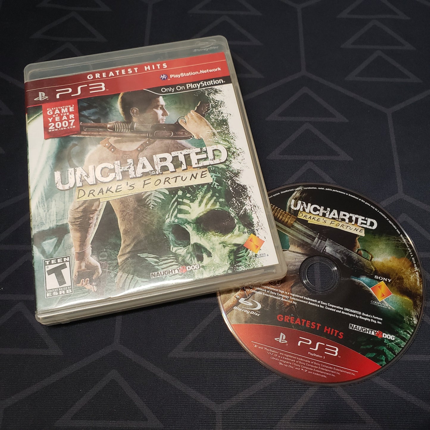Image shows the case and disc for the video game Uncharted: Drake's Fortune for Playstation 3