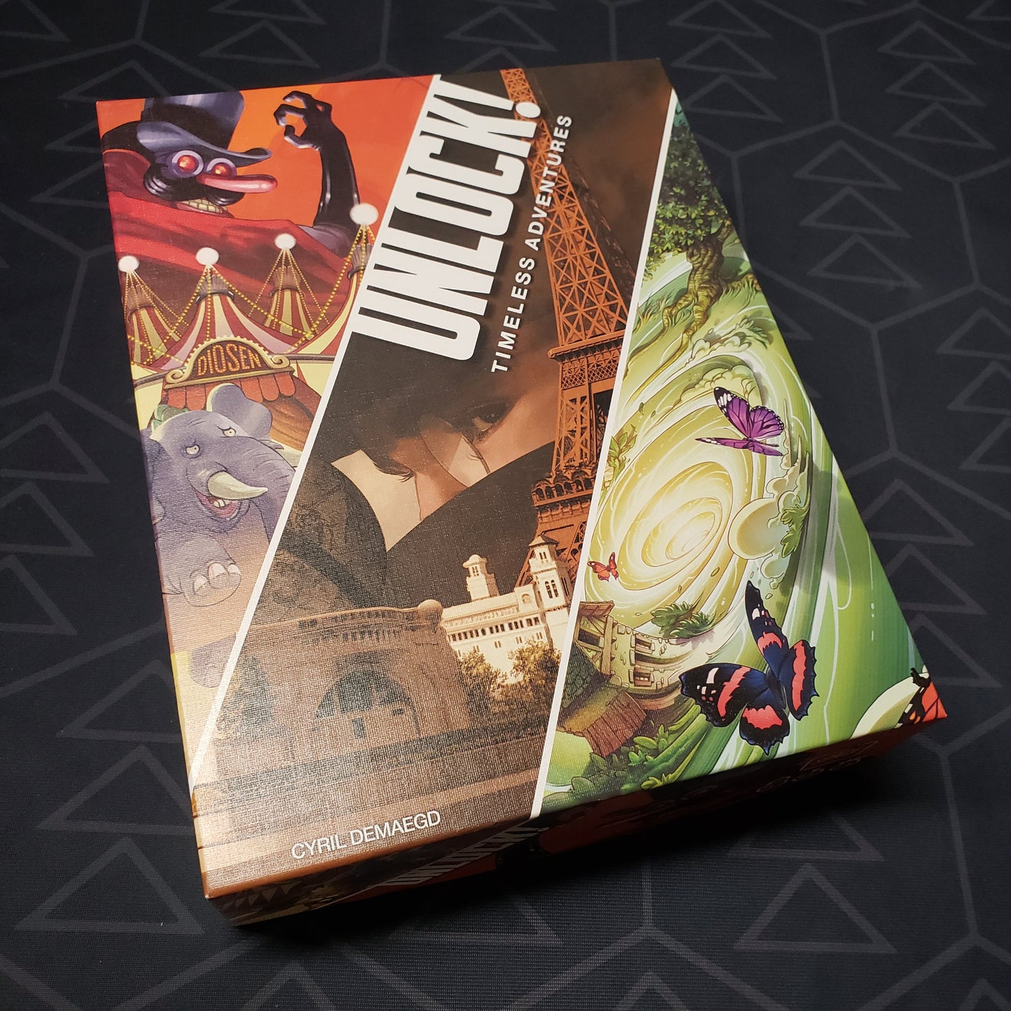 Image shows the front cover of the box of the Unlock!: Timeless Adventures card game