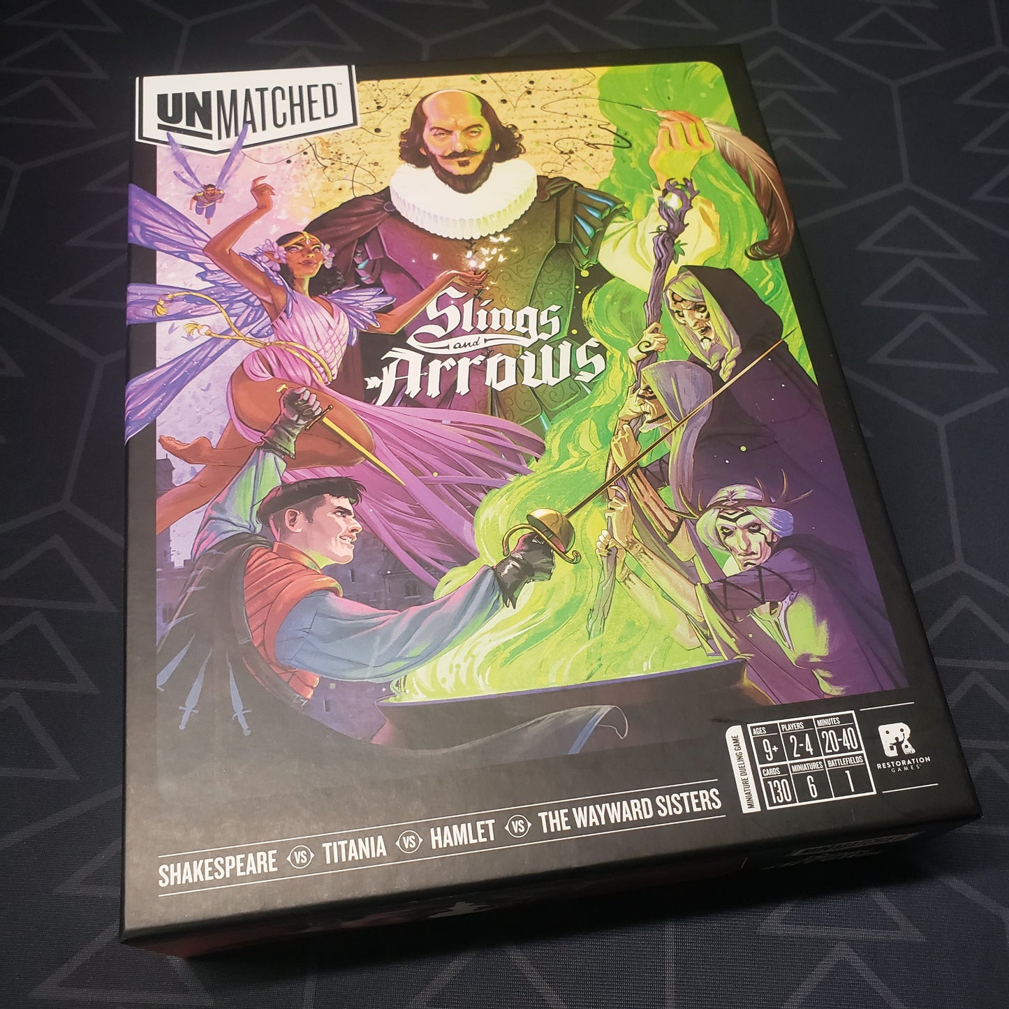 Image shows the front cover of the box of the Unmatched: Slings & Arrows board game