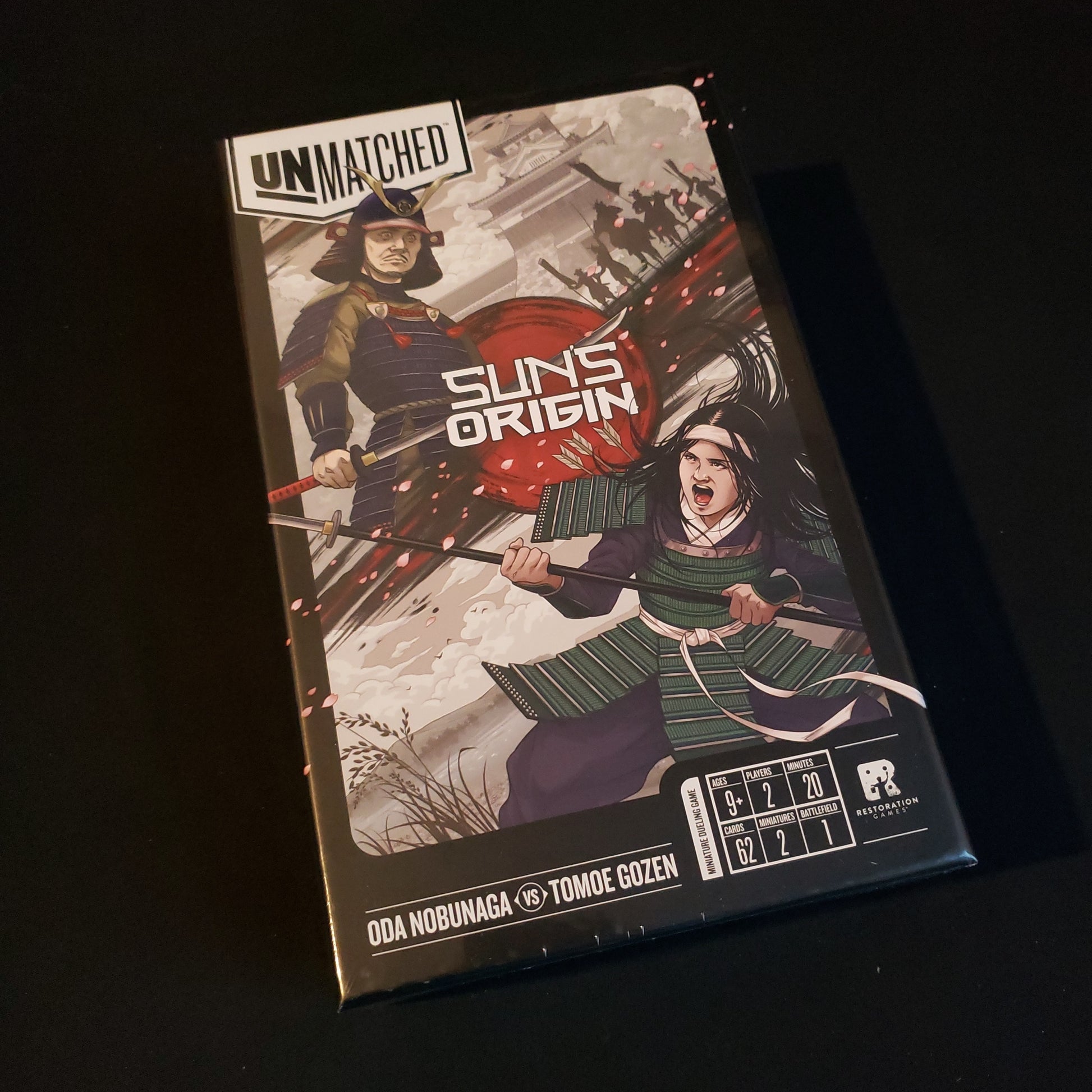 Image shows the front cover of the box of the Unmatched: Sun's Origin board game