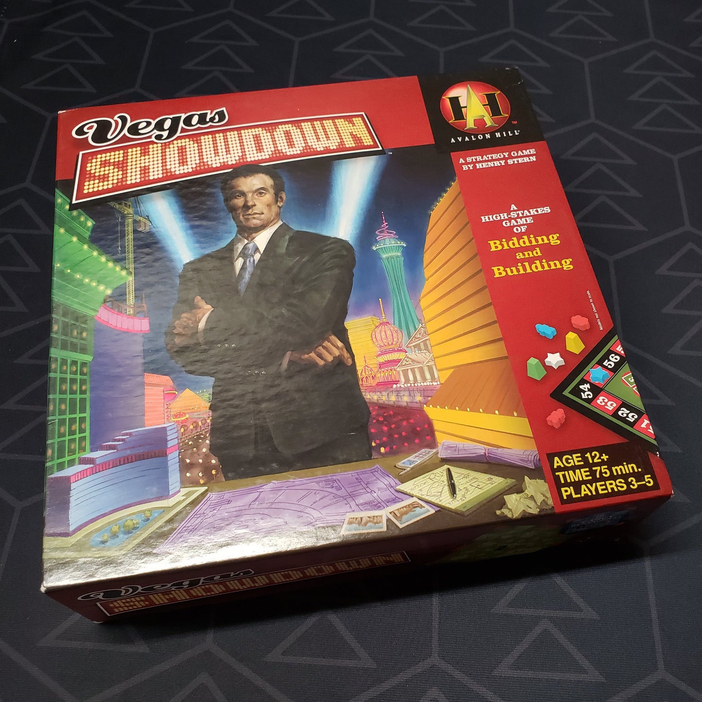 Image shows the front cover of the box of the Vegas Showdown board game