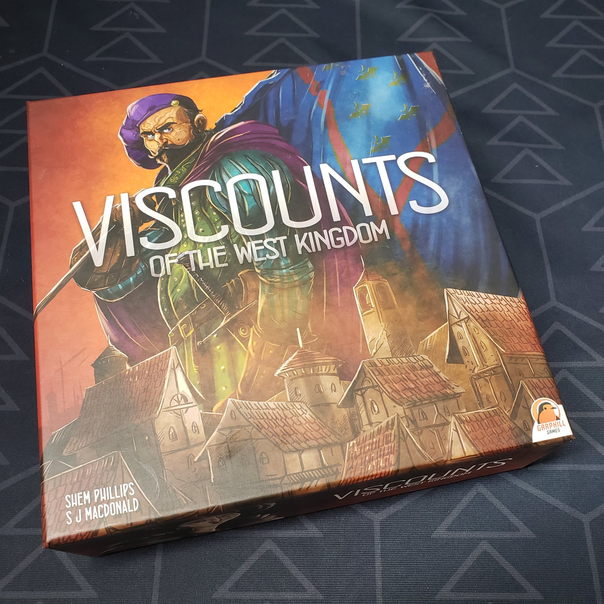 Image shows the front cover of the box for the Viscounts of the West Kingdom board game