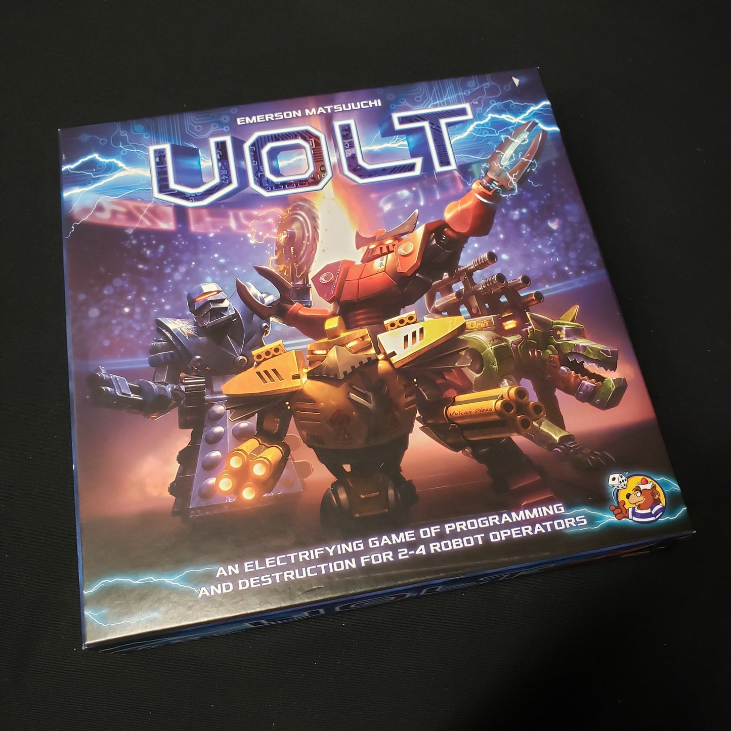 Image shows the front cover of the box of the Volt board game