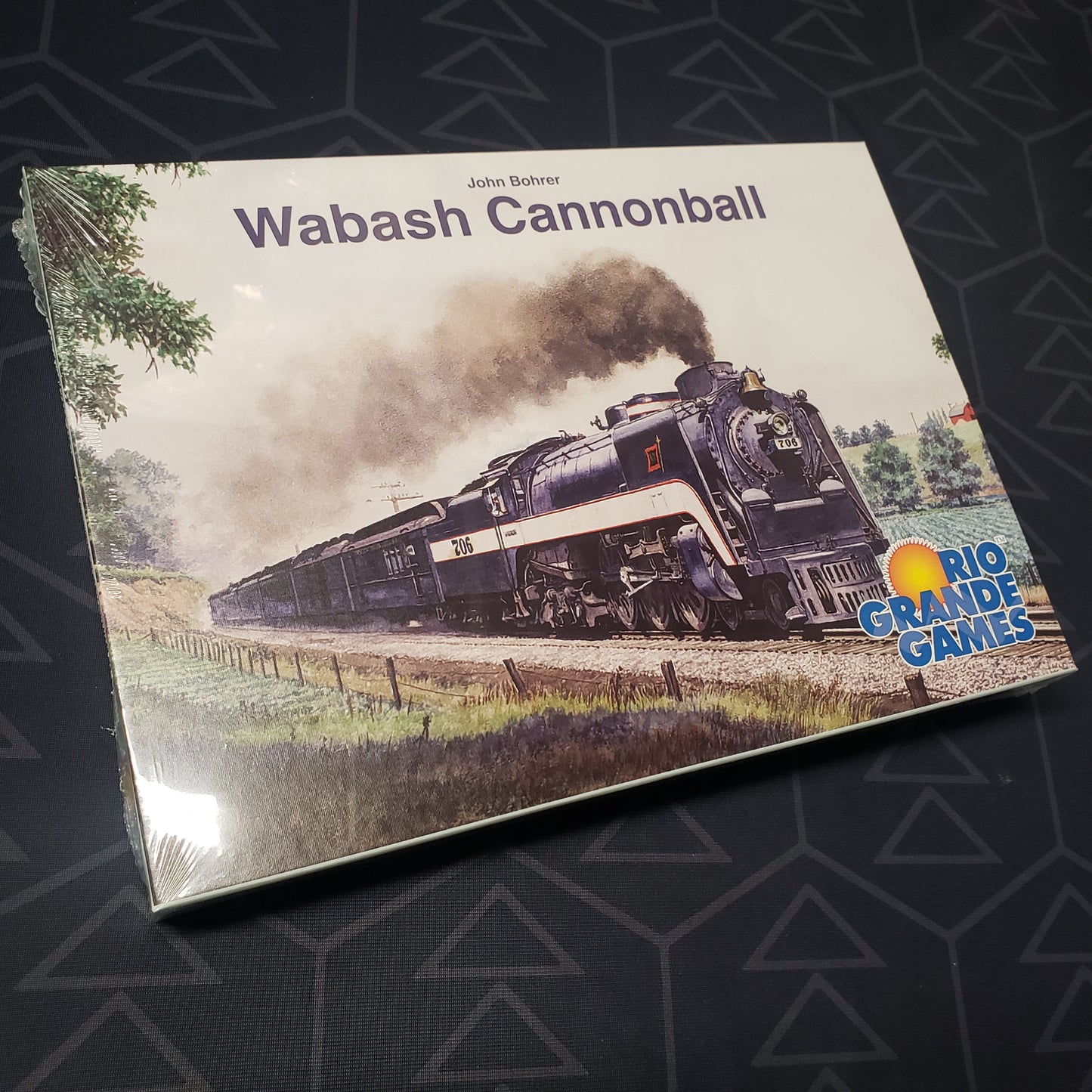 Image shows the front cover of the box for the Wabash Cannonball board game