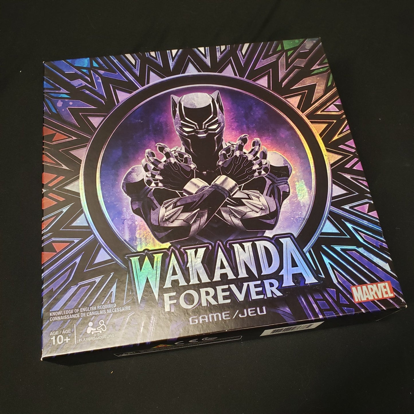 Image shows the front cover of the box of the Wakanda Forever board game