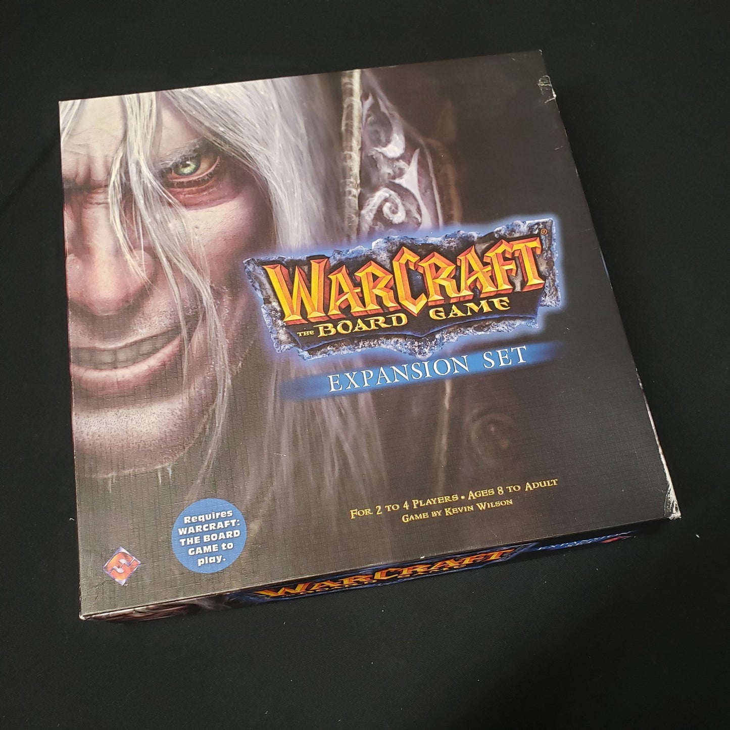 Image shows the front cover of the box of the Expansion Set for Warcraft: The Board Game