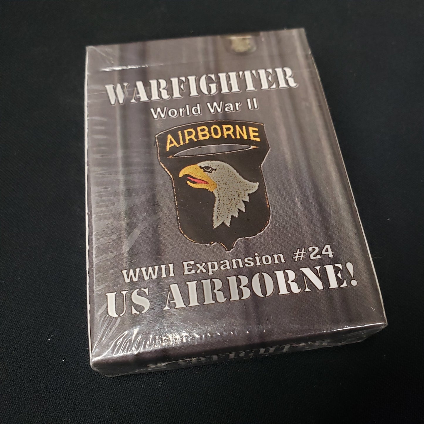 Image shows the front of the package for the US Airborne Expansion Pack for the Warfighter: WWII card game