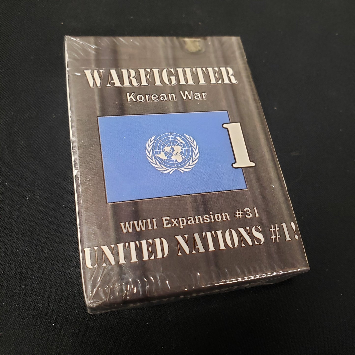 Image shows the front of the package for the Korean War: United Nations #1 Expansion Pack for the Warfighter: WWII card game