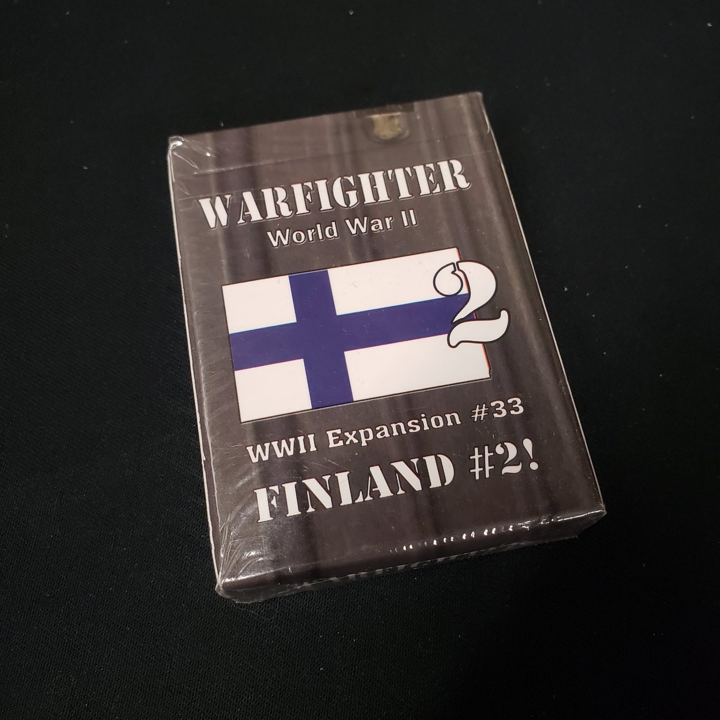Image shows the front of the package for the Finland #2 Expansion Pack for the Warfighter: WWII card game