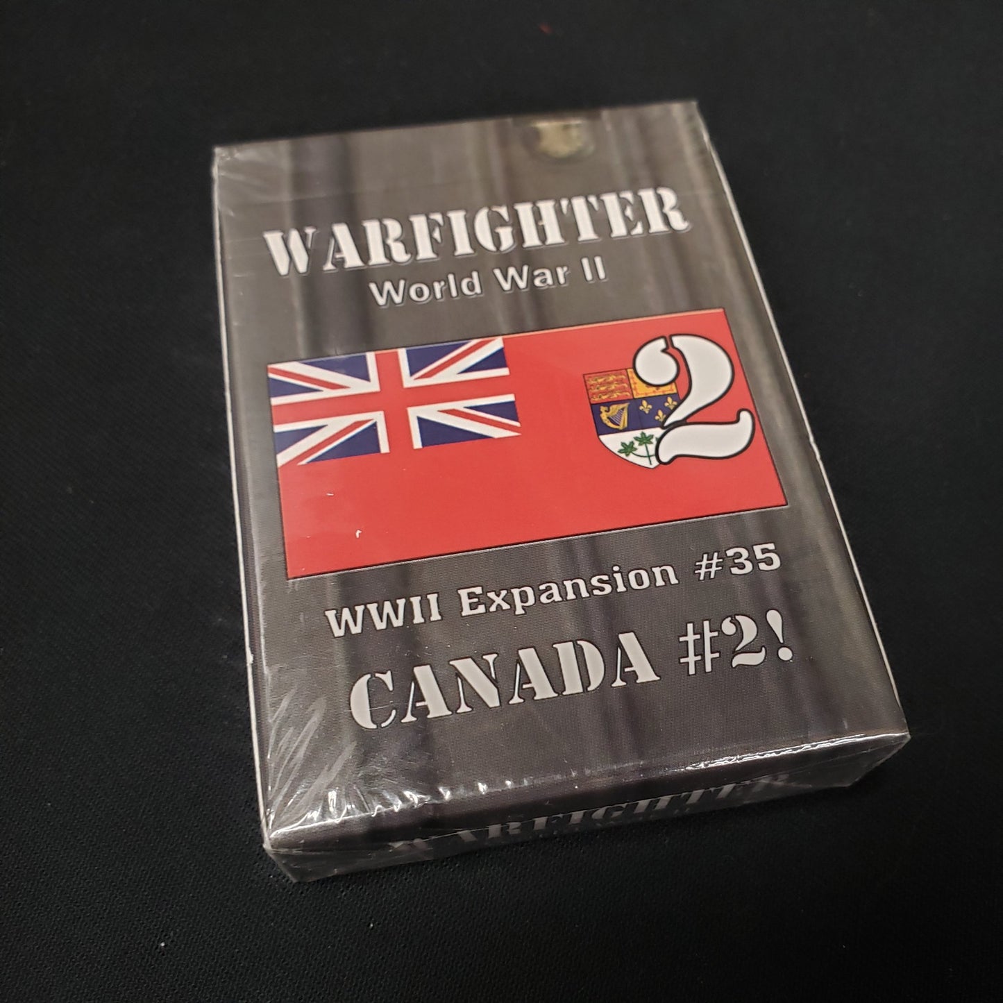Image shows the front of the package for the Canada #2 Expansion Pack for the Warfighter: WWII card game