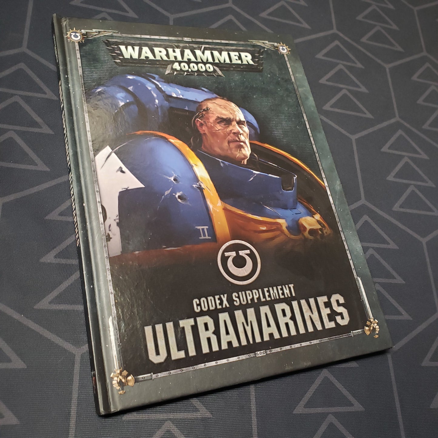 Image shows the front cover of the Warhammer 40,000 (Eighth Edition): Codex Supplement - Ultramarines wargaming book