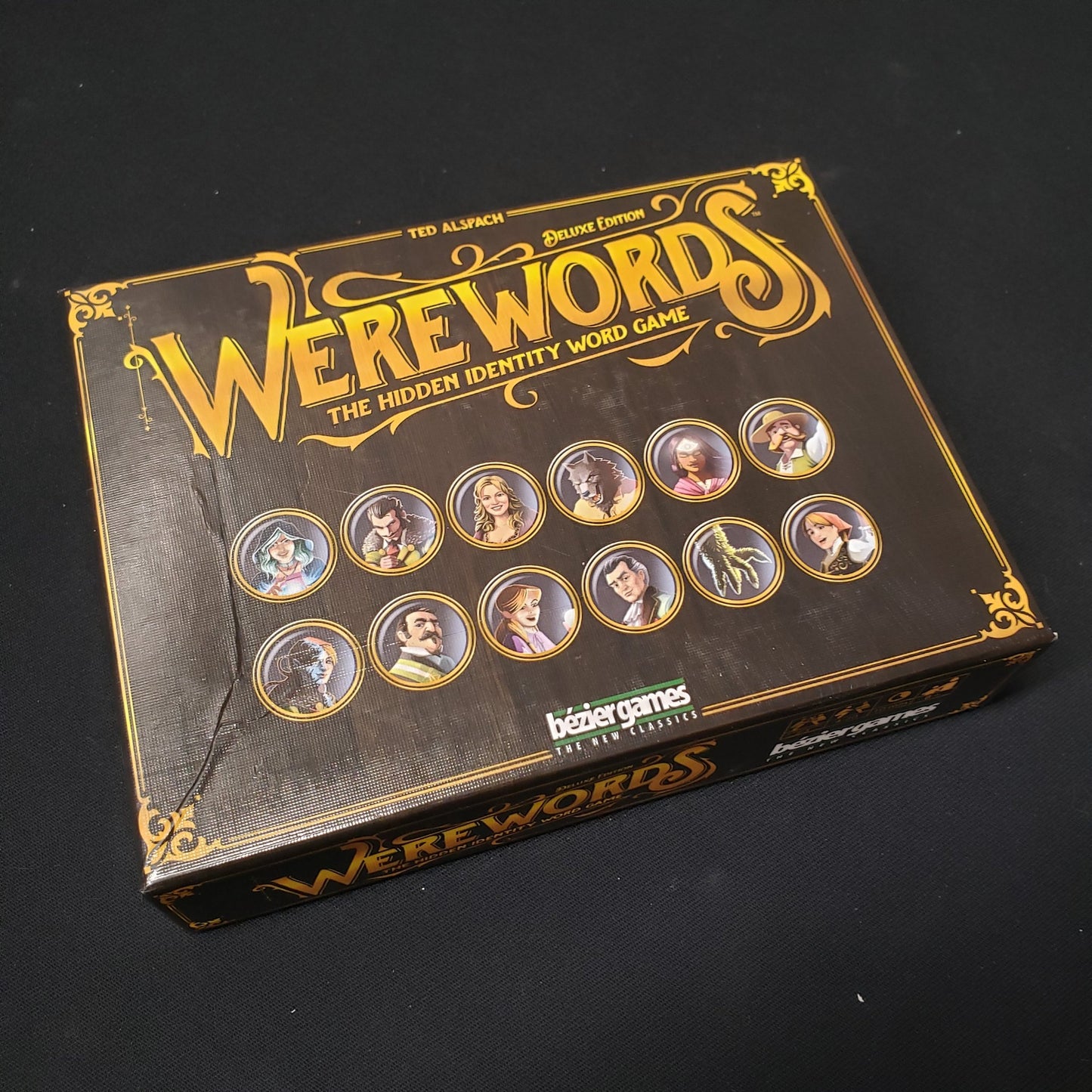 Image shows the front cover of the box of the Werewords card game