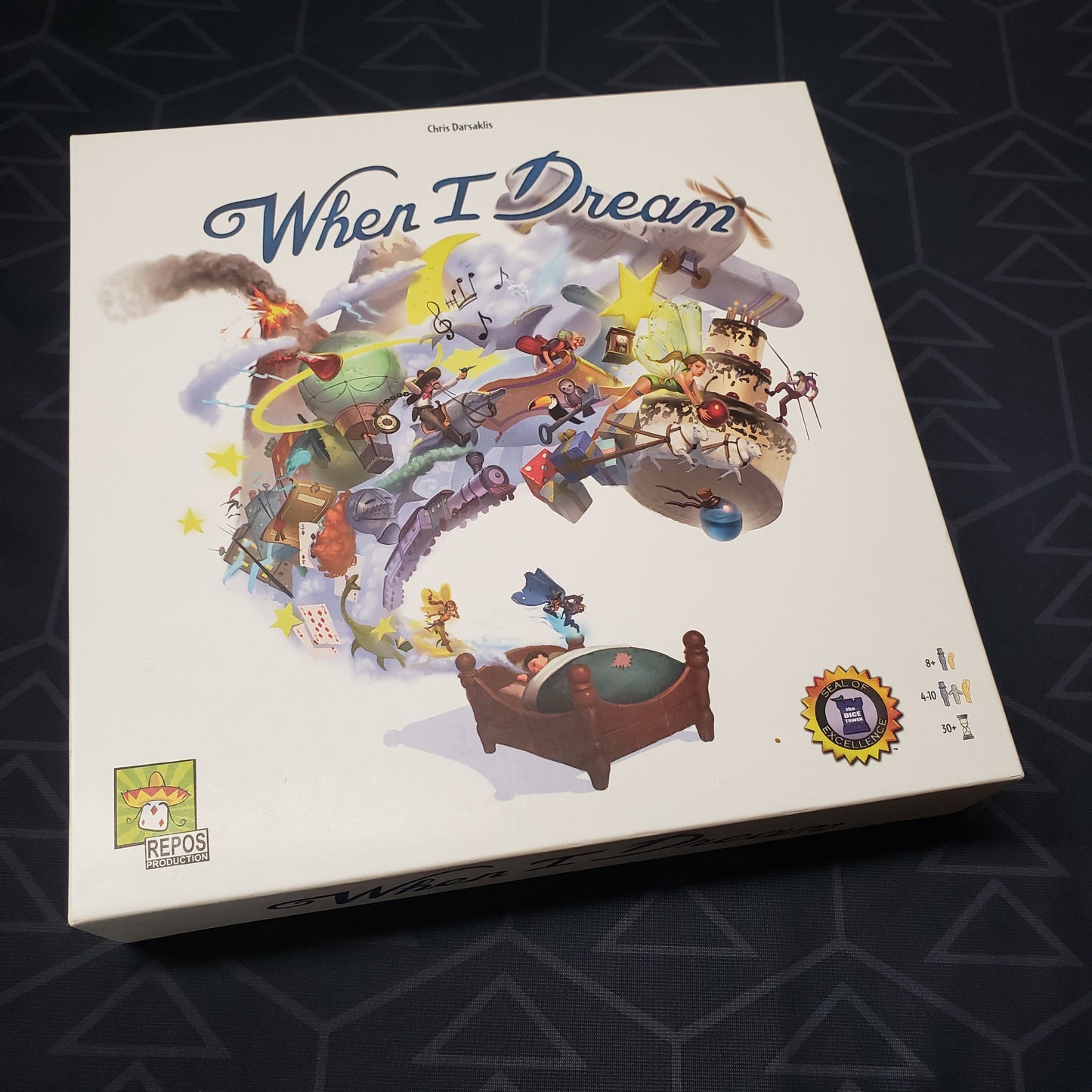 Image shows the front cover of the box of the When I Dream board game