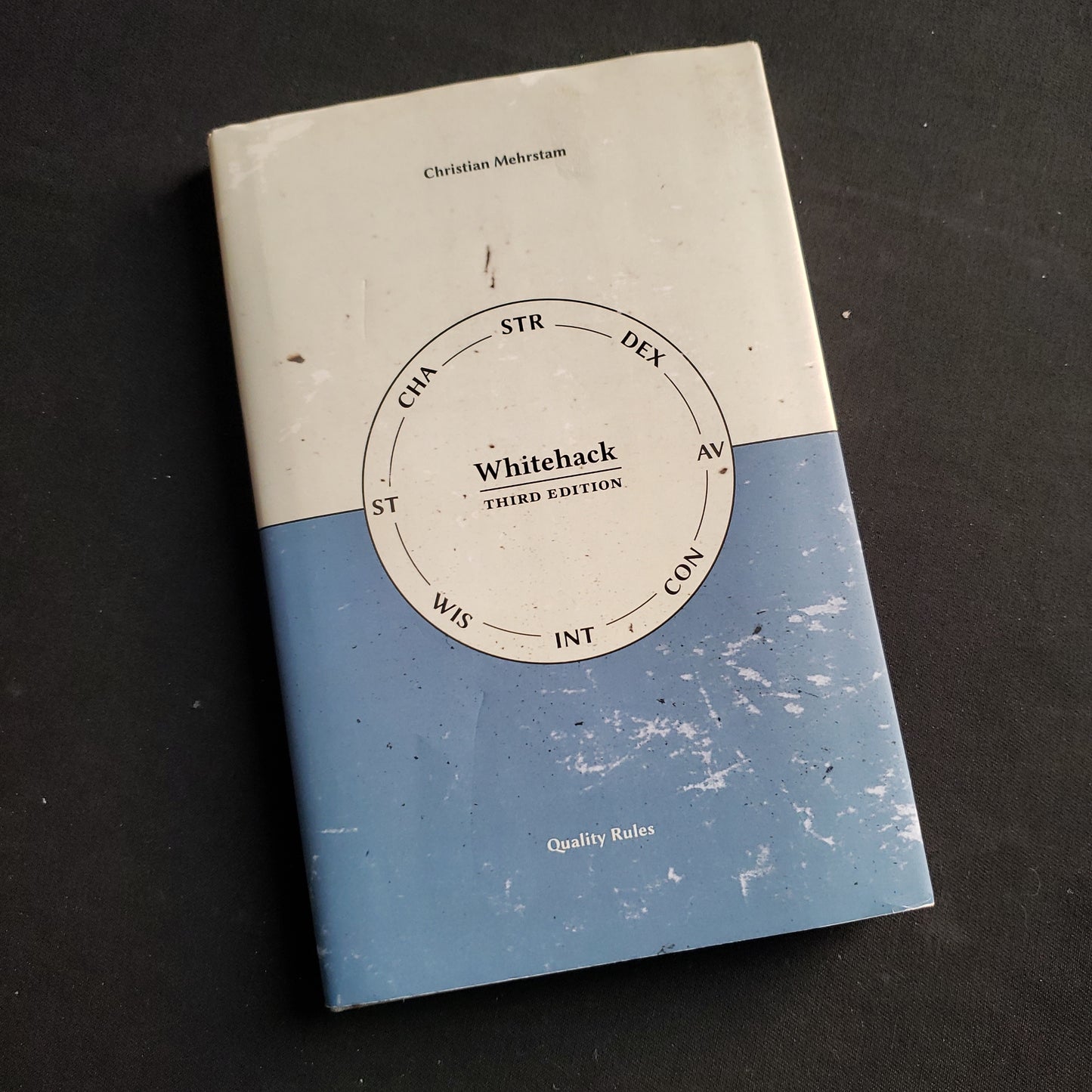 Image shows the front cover of the Whitehack: Third Edition roleplaying game book