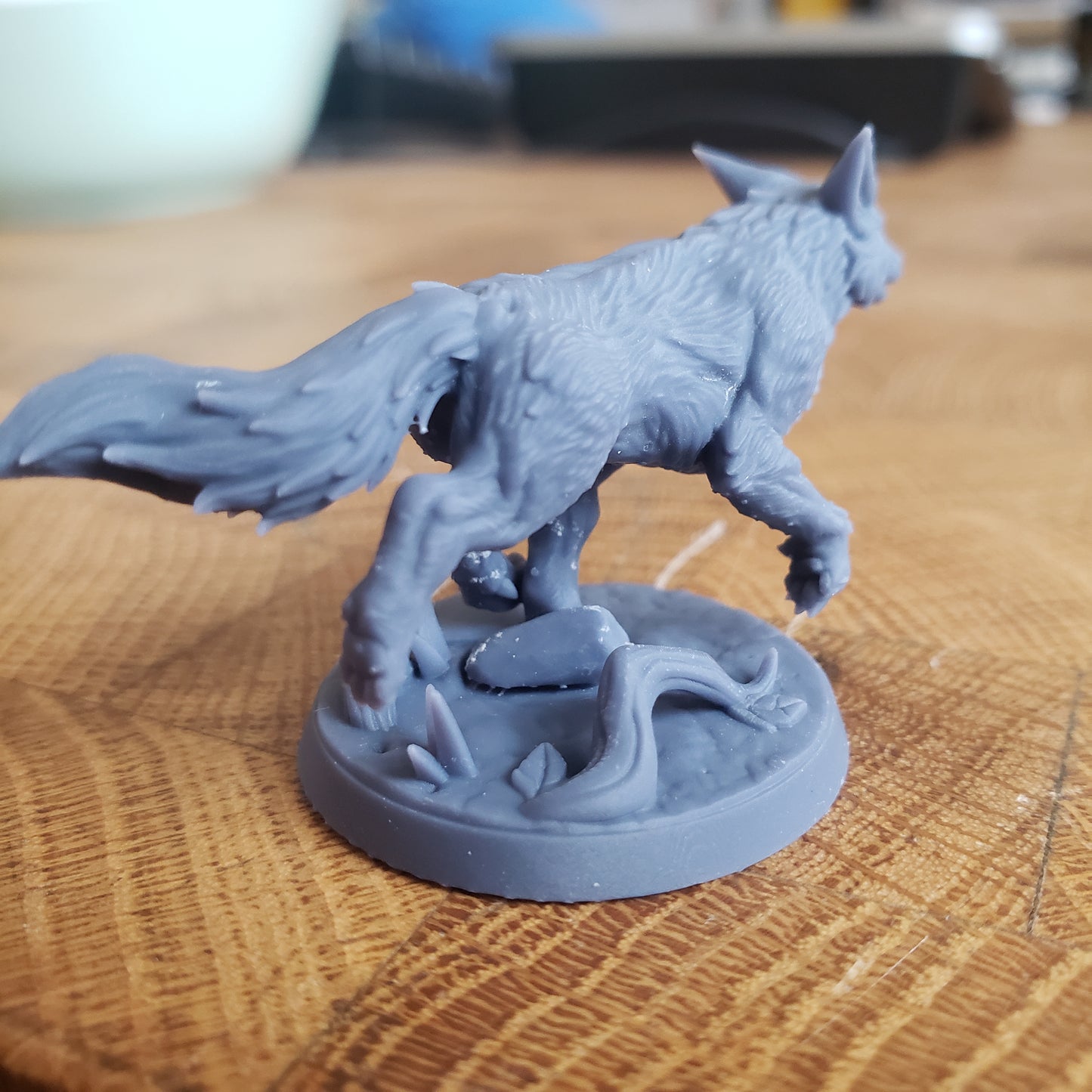 Image is a photo of a 3D printed wild fox gaming miniature printed in-house at All Systems Go
