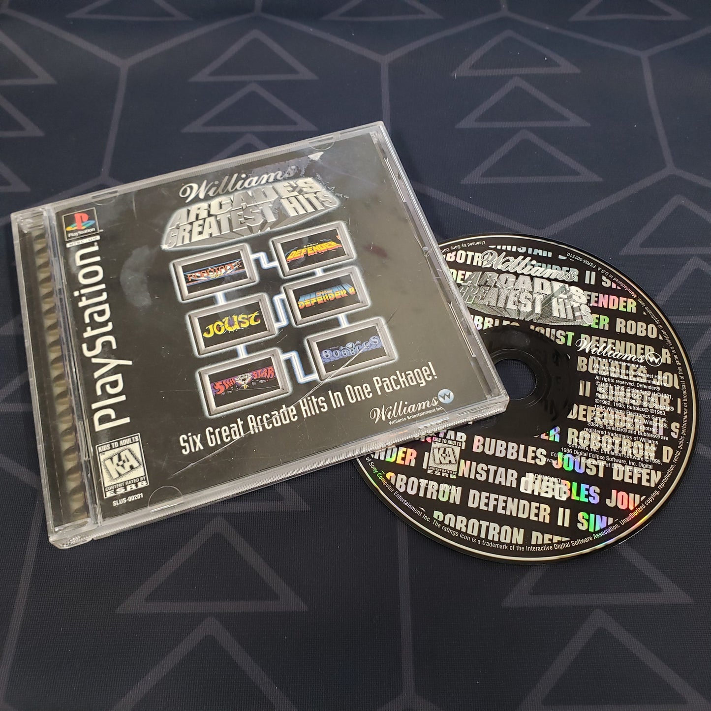 Image shows the jewel case with manual and disc for the video game Williams Arcade's Greatest Hits for Playstation 1