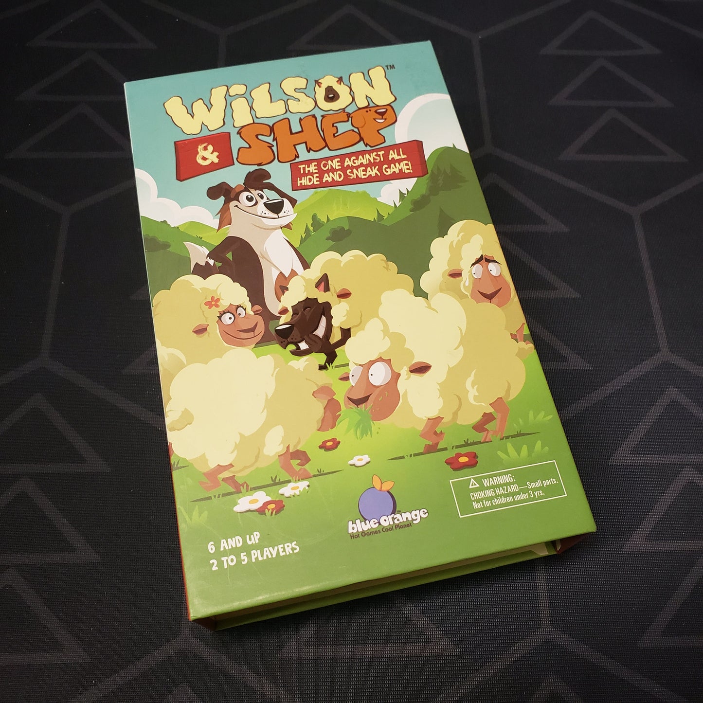 Image shows the front cover of the box for the Wilson & Shep board game
