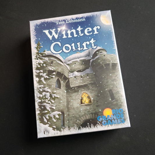 Image shows the front cover of the box of the Winter Court board game