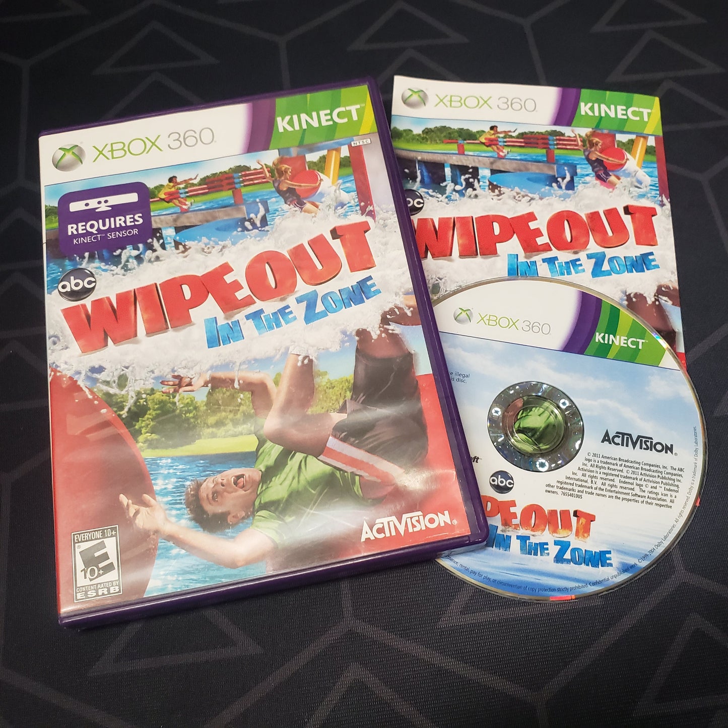 Image shows the case, manual & disc for the video game Wipeout: In the Zone for Xbox 360