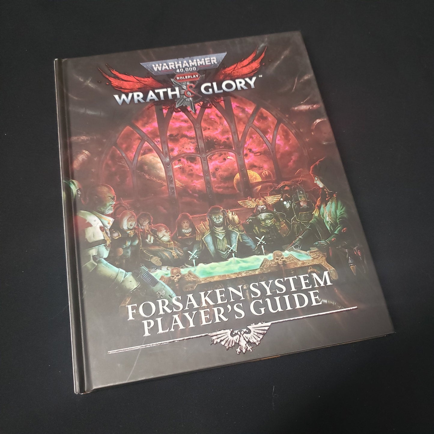 Image shows the front cover of the Forsaken System Player's Guide book for the roleplaying game Wrath & Glory