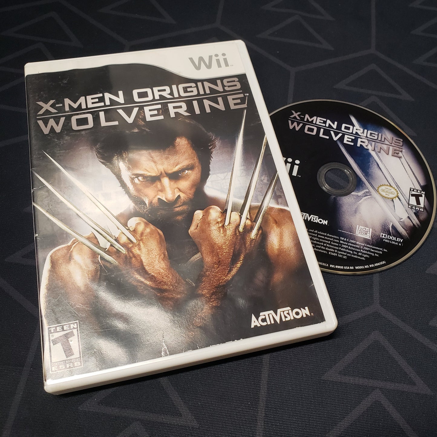 Image shows the case and disc for the video game X-Men Origins: Wolverine for Nintendo Wii