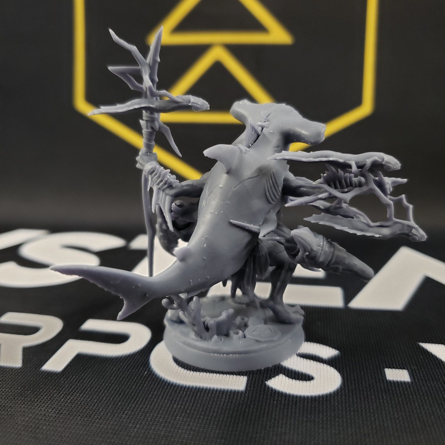 Image shows the back of a 3D printed merfolk beastmaster gaming miniature