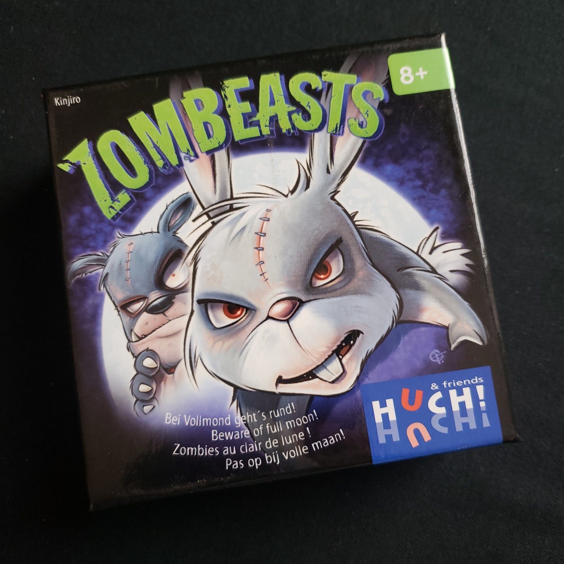 Image shows the front cover of the box of the Zombeasts card game