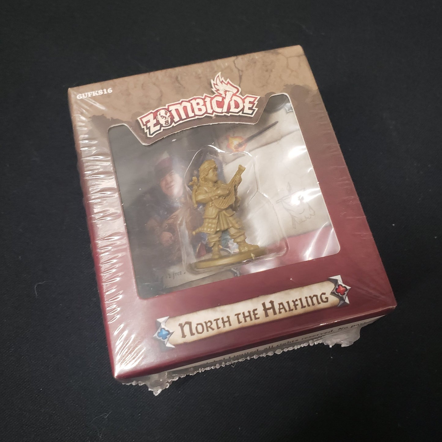 Image shows the front of the box for the North the Halfling Character Pack expansion for the board game Zombicide: Black Plague