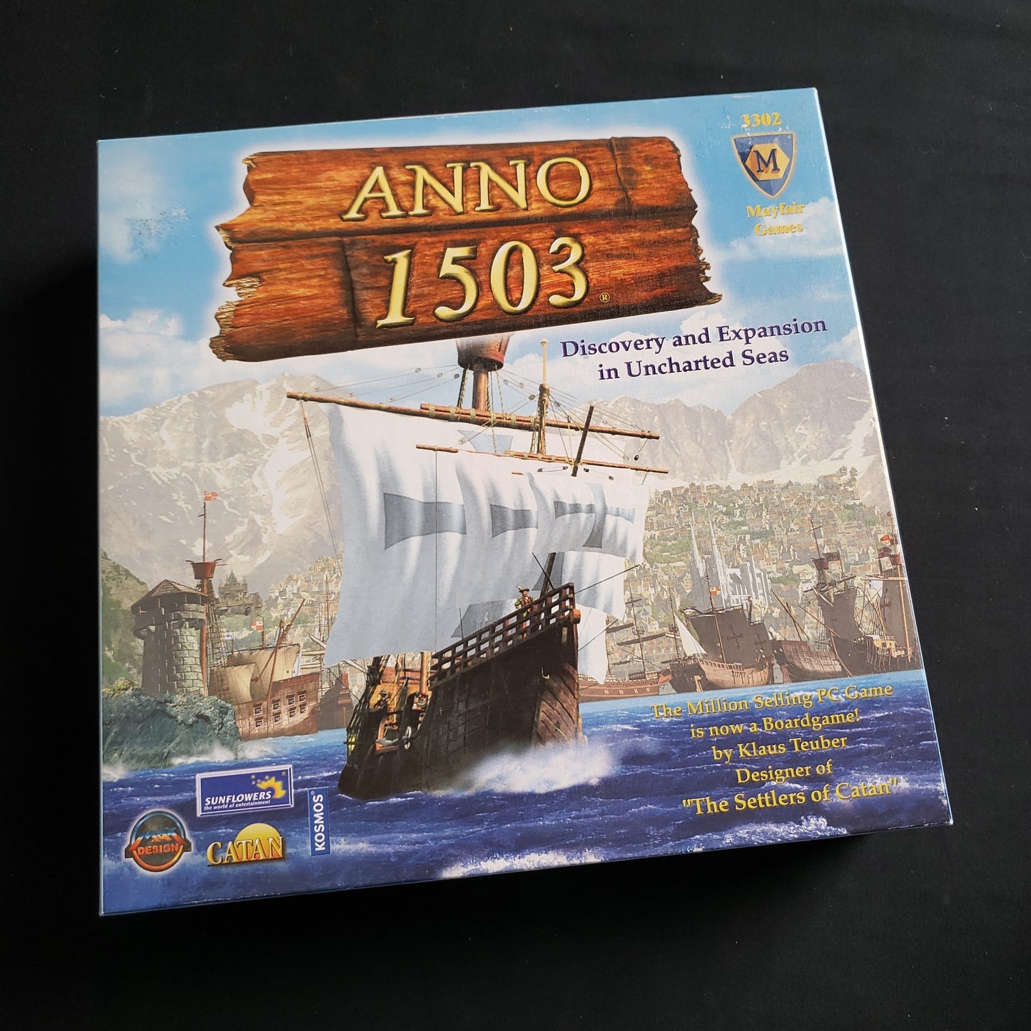 Image shows the front cover of the box of the Anno 1503 board game
